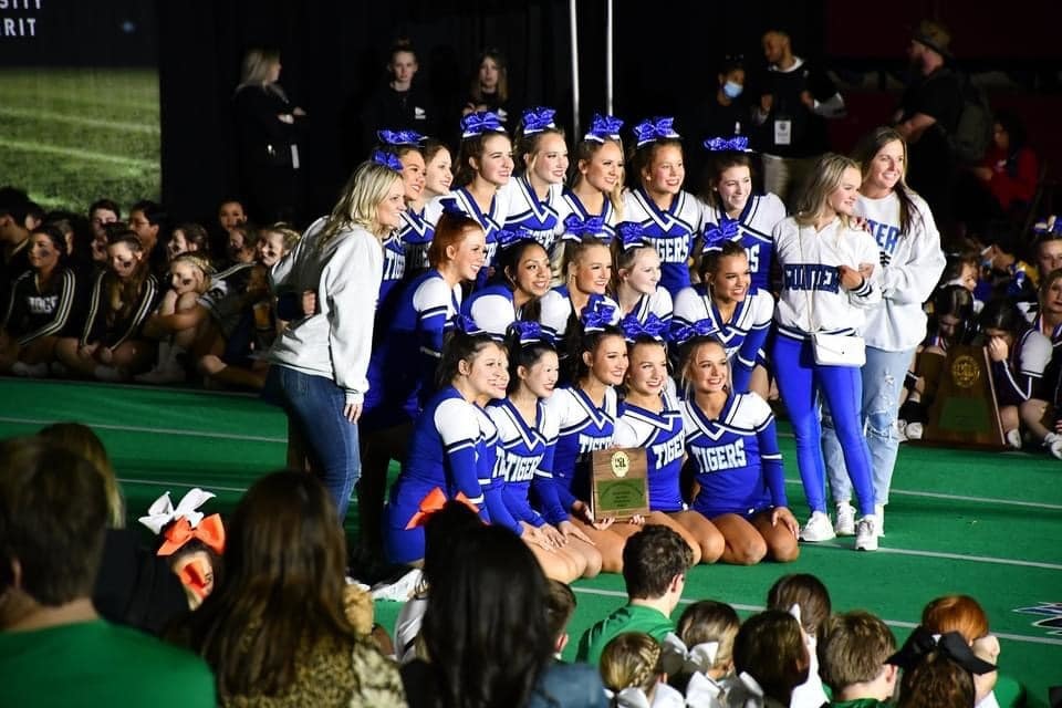 Cheer team with trophy